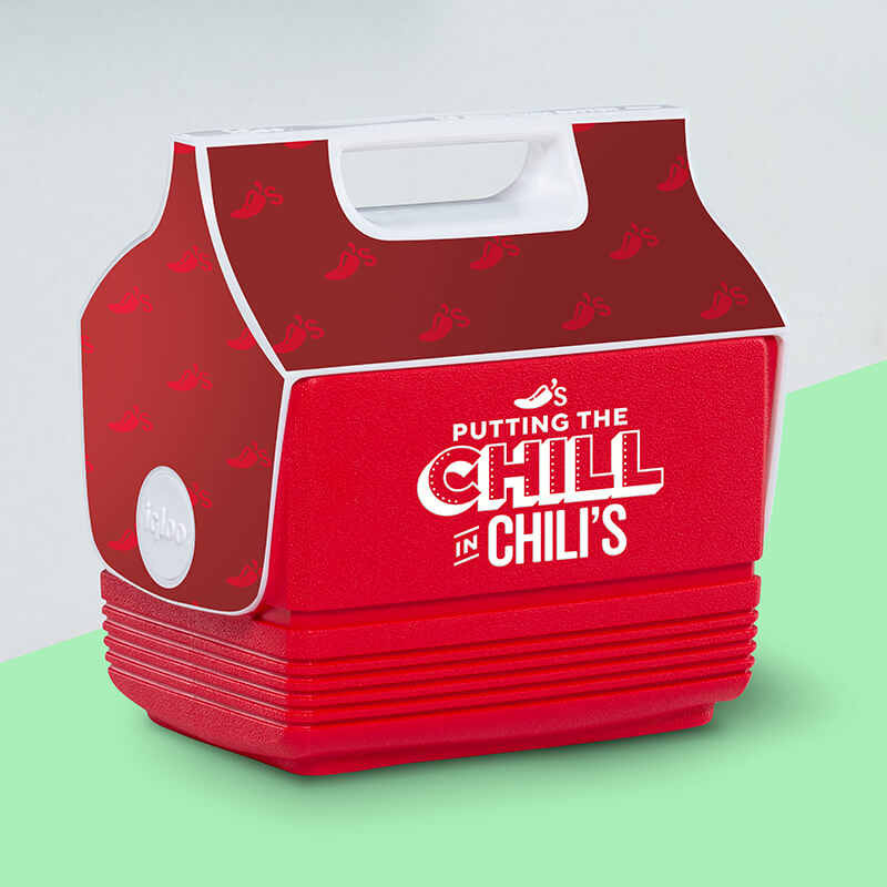 A bright red cooler reads "Putting the Chill with Chili's" on the side, with a Chili Pepper Logo at the top. Chili Pepper logo pattern covering the lid of the cooler.